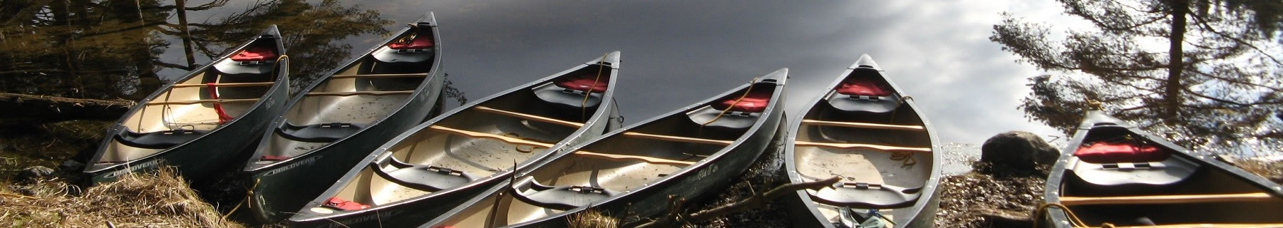 canoes at lakeside