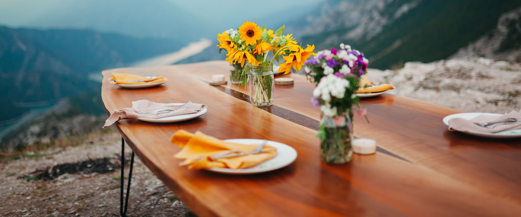 food on a table in the mountains