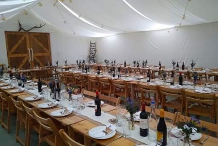 long wedding tables in marquee